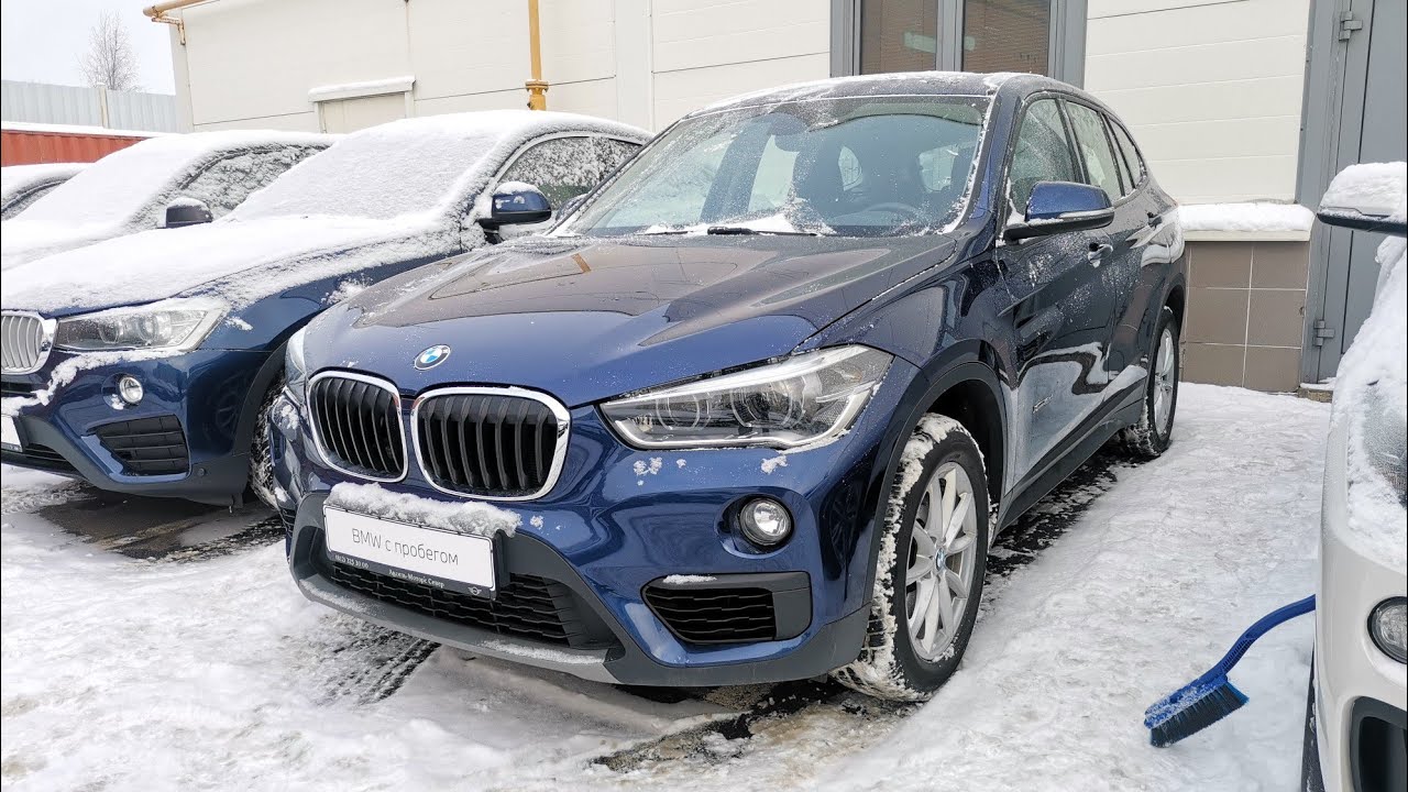 bmw x1 номер двигателя где находится