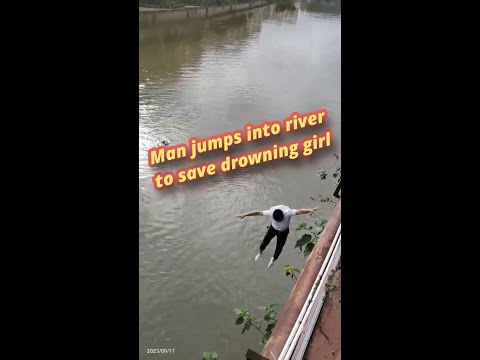 Man jumps into river to save drowning girl in S China