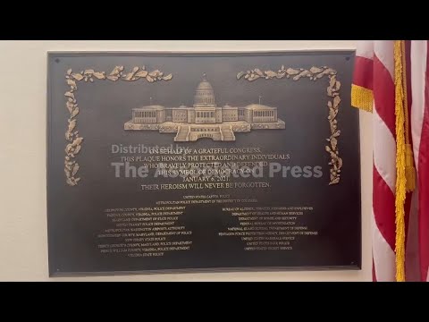 Nearly 100 lawmakers display Jan. 6 plaque replicas in Congress