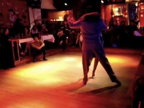  Andres Laza Moreno  and  Samantha Dispari  are  dancing  to  the  tango  "  Corazon  "
