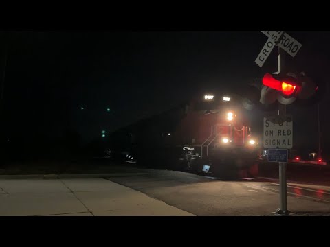 CN ET44AC’s #’s 3107 & 3268 lead CN M384 north through Trenton, MI (2/28/23)