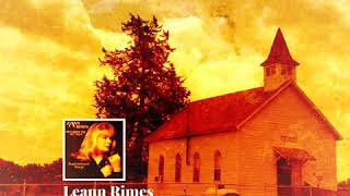 LEANN RIMES clinging to a saving hand