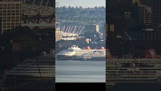Plenty of dwarfs helping get Disney Magic off to drydock with supplies