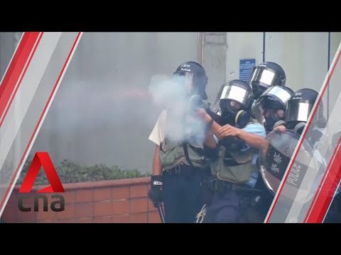 Hong Kong police fire tear gas at protesters in Sham Shui Po