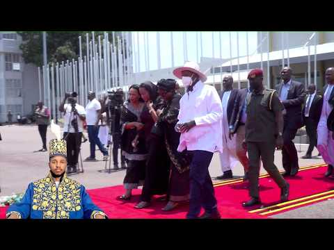 PRESIDENT MUSEVENI COMFORTS LATE KING OYO'S MOTHER AT ENTEBBE  AIRPORT