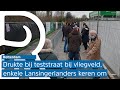 Drukte teststraat RTHA, meerdere mensen maken rechtsomkeert