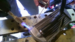 How to weld aluminum with a propane torch and low heat aluminum welding rods fix your radiator.