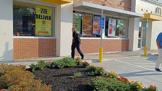 Boston police respond to a fight at the McDonald's on Warren Street