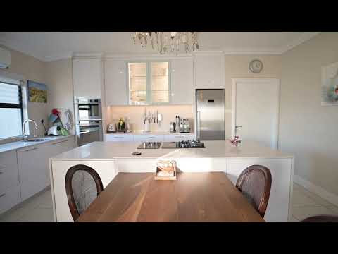 Retire in this stylish 4 bed freehold home