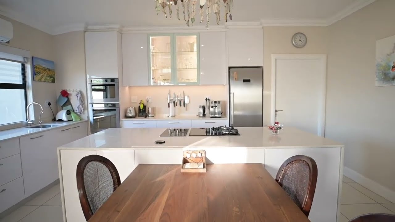 Retire in this stylish 4 bed freehold home