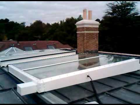 Retracting Skylight - Slightly Pitched, Flat, Bi-Parting.