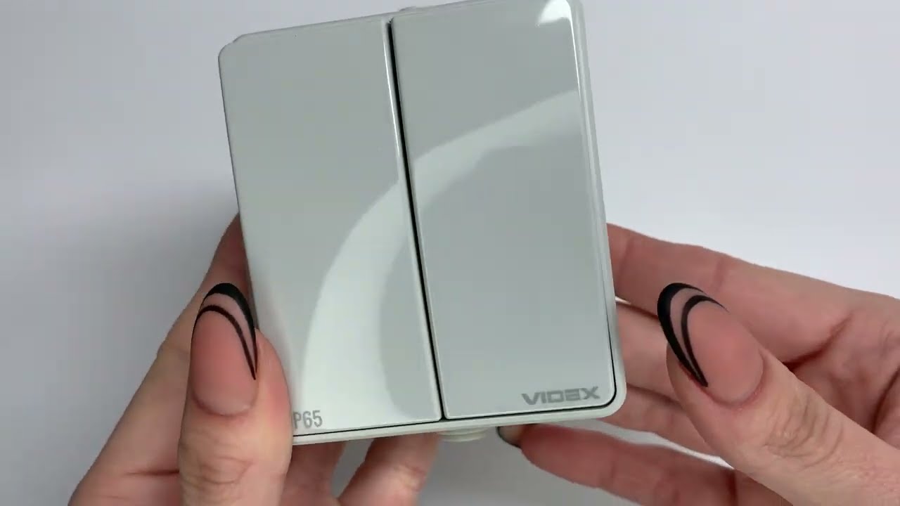 Вимикач двоклавішний зовнішній VIDEX BINERA IP65 VF-BNW12-G