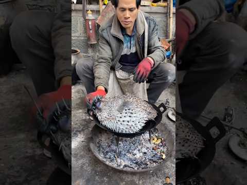 ลุงเชฟจัดเมนูต้มไก่ใส่ปลาปักเป้า