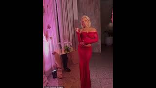 Tammy Hembrow leaves very little to the imagination as she busts out of her sheer red ensemble after