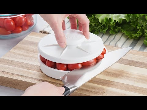 Cut a batch grape tomatoes with one slice.