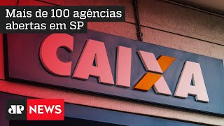 Caixa abre agências para pagar auxílio