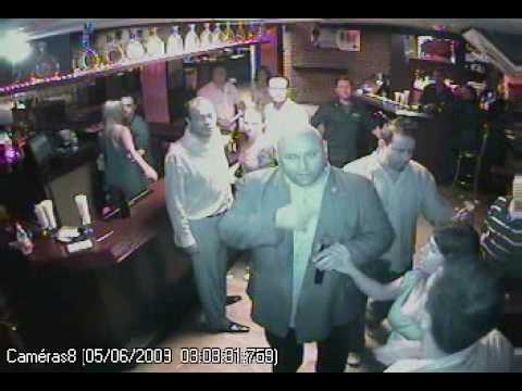 Bouncer head slaps an idiot in nightclub after he pushes a staff member