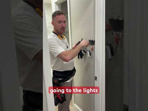 Touching 120v wire with bare hand and not getting shocked. #electrician