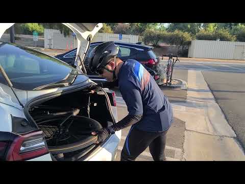 Tesla model 3 transporting a road bike with out taking front wheel off