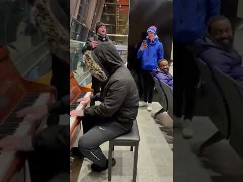 Rangers fan giving it laldy on the piano ( Not my footage)