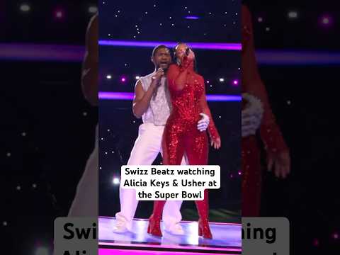 Swizz Beatz watching Alicia Keys & Usher perform at the Super Bowl