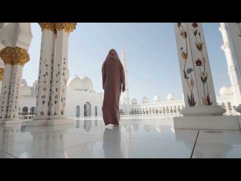 Woman in hijab walking at mosque