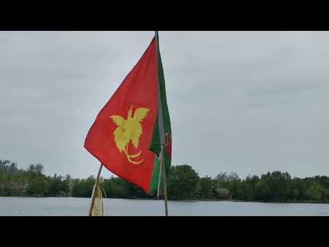 EAST SEPIK PROVINCIAL FLAG FLYING IN THE MIDDLE OF MURIK LAKE