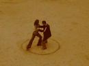 Dancing Tango and drawing YinYang in the sand (By Pablo Kliksberg and Eloixa Oyhamburu)