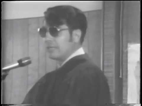 Jim Jones preaching at a Peoples Temple Meeting in 1971