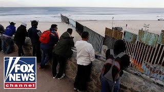Migrant caravan groups begin arriving at US border