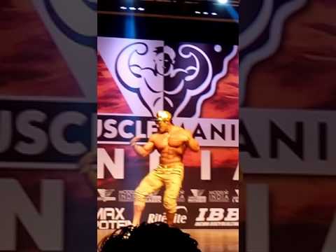 Chul soon posing at muscle mania India 2016