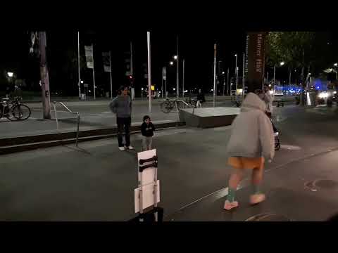 Melbourne busker pop singer Frankie Lee drawing dancers on the floor, the young one is so adorable
