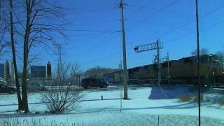 preview picture of video 'Union Pacific SD70M and SD9043MAC barnstorm through Sussex, Wisconsin (2/11/12)'