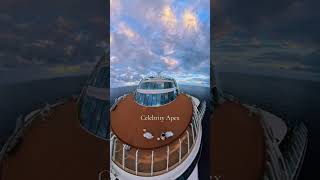 Walking the open decks of Celebrity Apex during a quiet Caribbean sunset at sea.