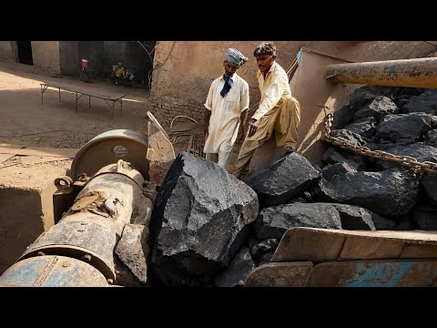 Giant Rock Crushing Machine at WorkPowerful Stone Crusher in ActionMassive Rocks Being CrushedFastHe