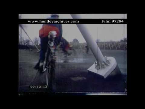 Speeded up film of cyclists, late 1970's.  Archive film 97284