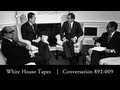 LEE KUAN YEW and Richard Nixon exchange views.