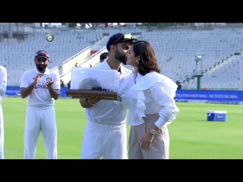 Virat Kohli Hug and Kiss to Anushka Sharma on Field on His 100th Test Cap Ceremony