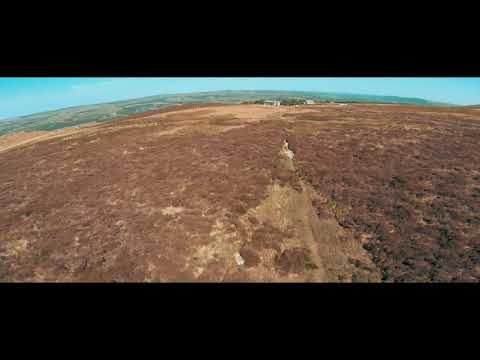 Drone Ilkley moor cow and calf and the twelve apostles stones. FPV.