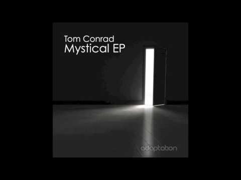 AM066 Tom Conrad - Better Here Than Never