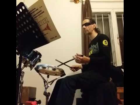 Practicing Jim Chapin book with clave foot pattern