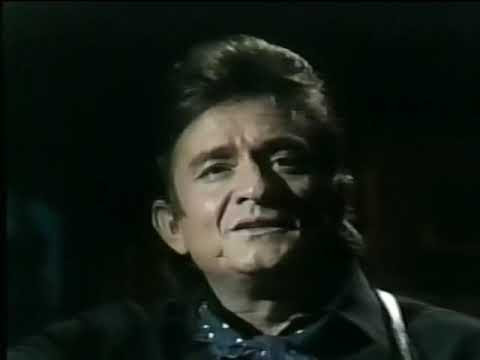 Johnny Cash and Anita Carter sing "Uncloudy Day" and "No Setting Sun"