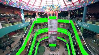 shopping mall interior with green screen advertisi