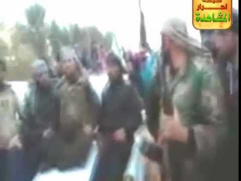 استعراض لواء أحرار المشاهدة في قرية عشائر في ريف البوكمال