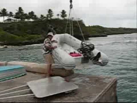 Launching from the Dinghy Dock in Niue in 20 knots of wind