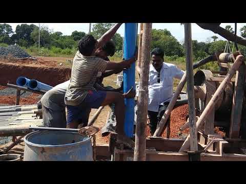 Inserting casing pipe in borewell