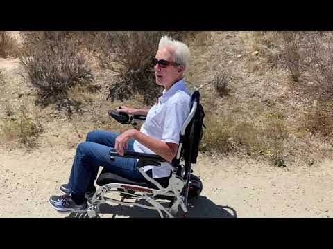 Driving Discovery Super Lightweight 41 lbs Folding Electric Wheelchair thru gravel Porto Mobility