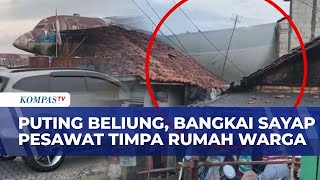 Download lagu A tornado struck Bogor, causing the wing of a plane to hit a house, severely damaging the roof. mp3