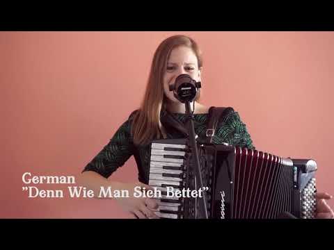 Mary Knapp plays accordion, sings in 4 languages