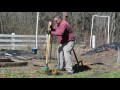 Manual auger post hole digger